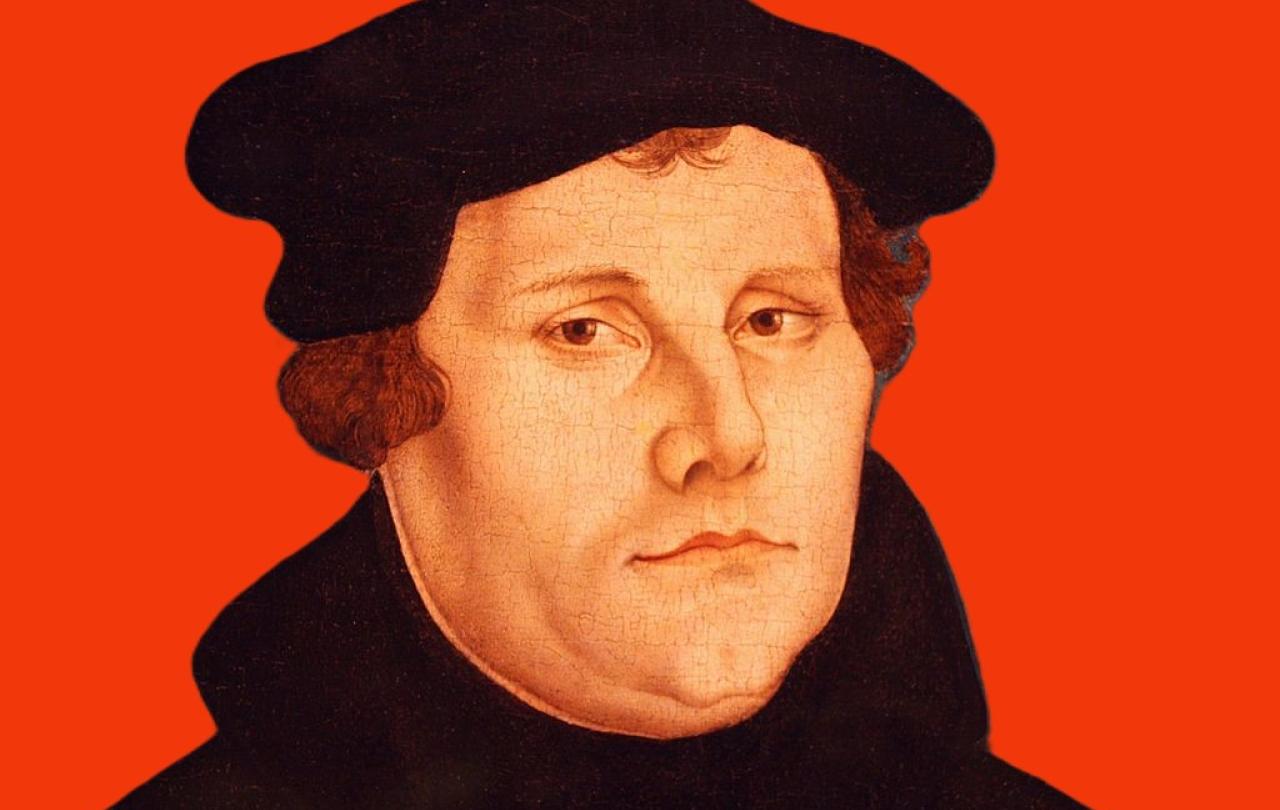 A head and shoulder painting of Martin Luther against a red background