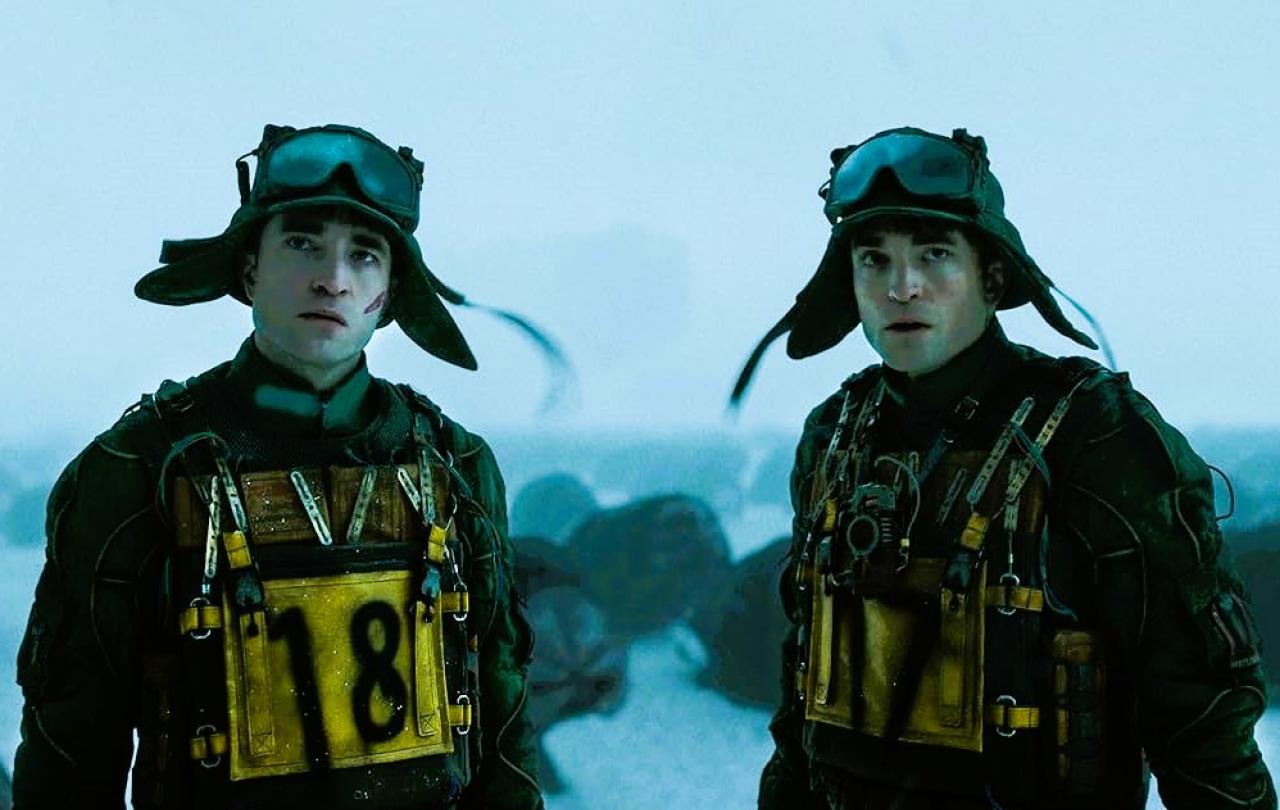 Two cloned humans stand side by side.