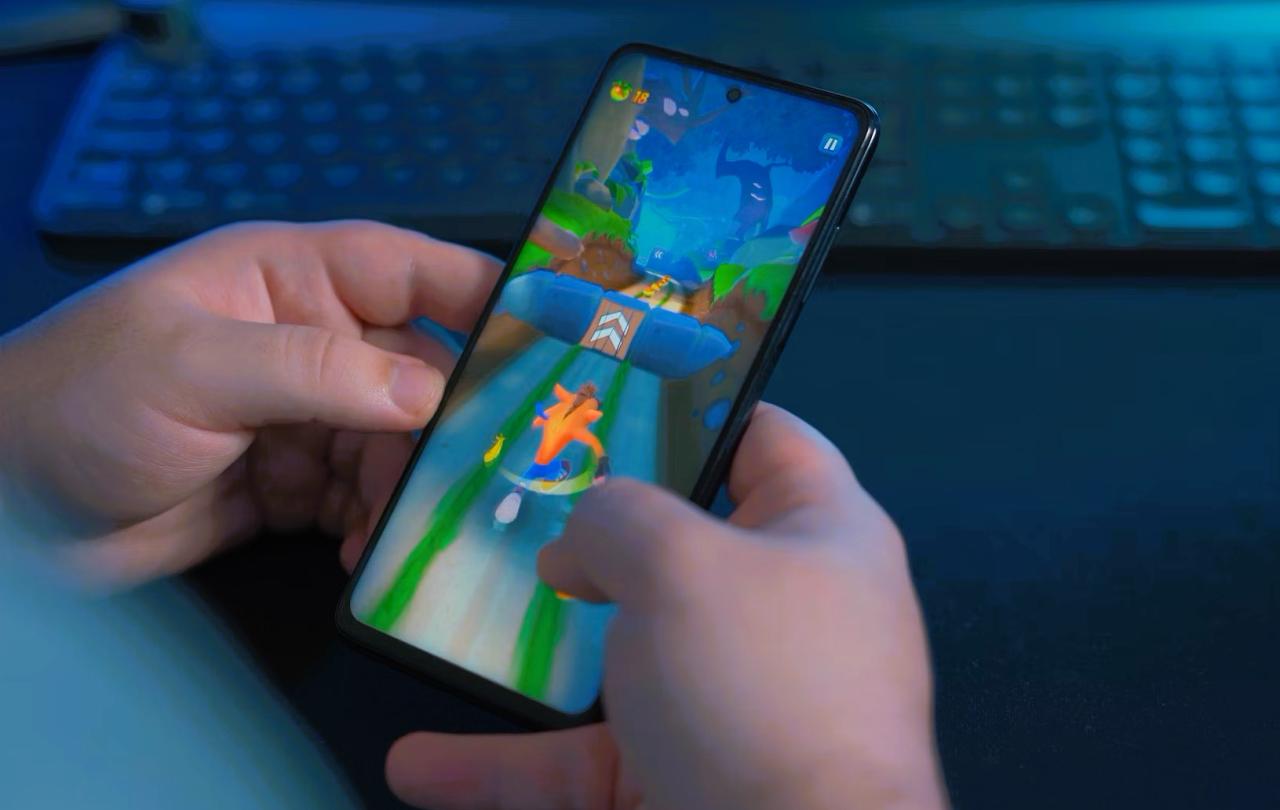 A gamer plays on a phone.