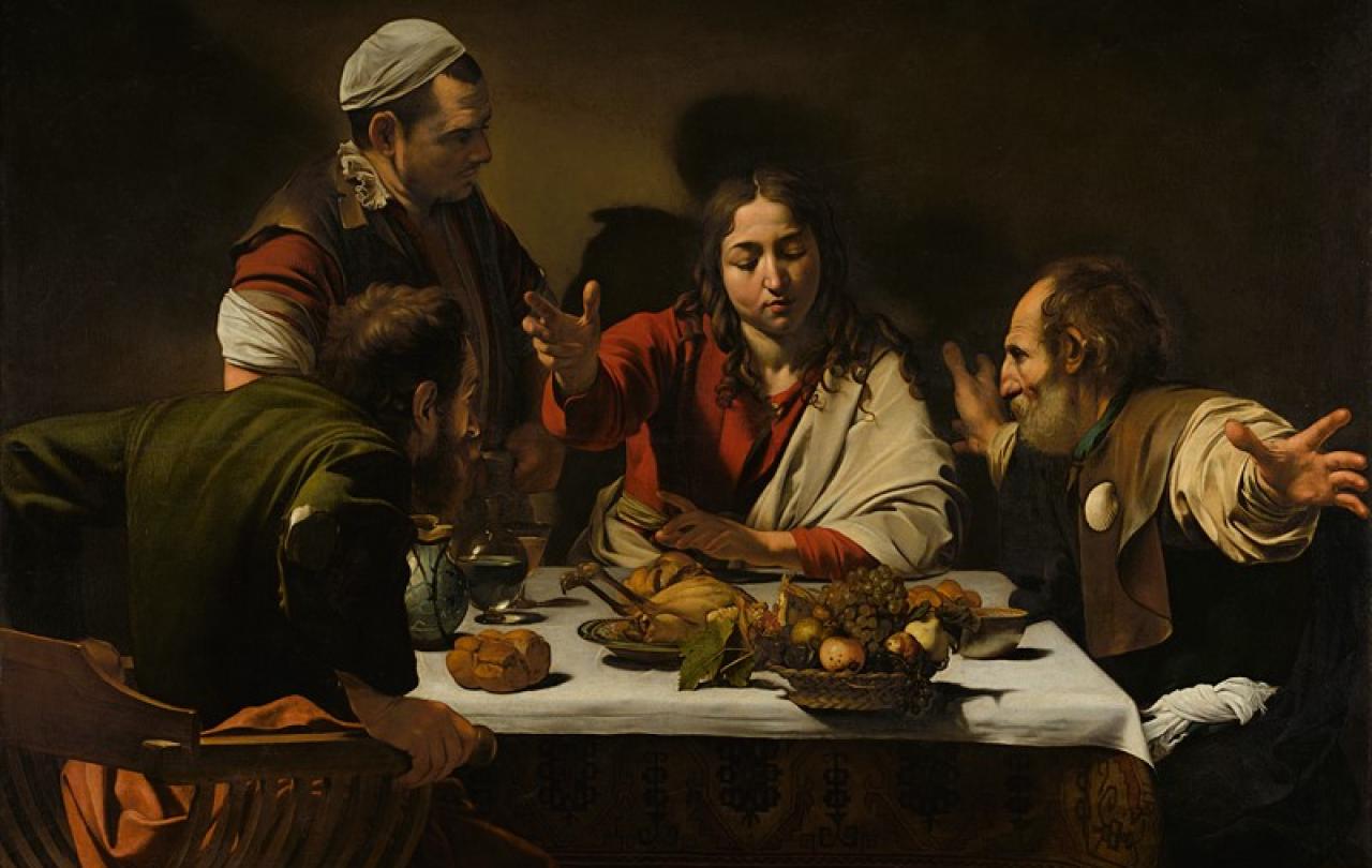 A painting depicts Jesus talking to disciples at a meal.