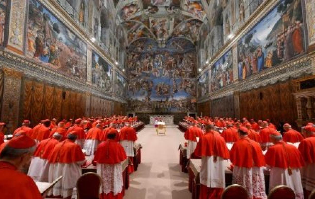 A gather of cardinals in the Sistene Chapel.