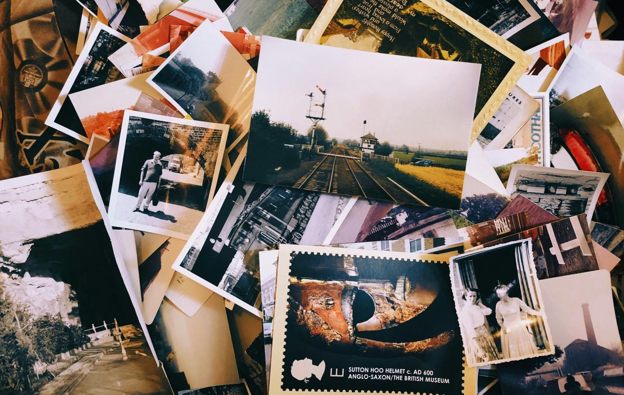 A jumbled pile of old photographs.