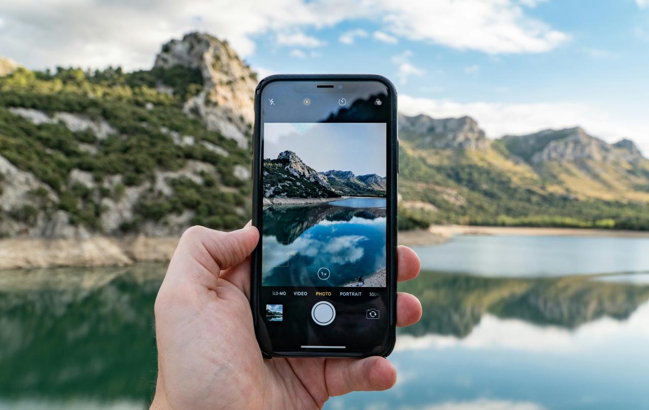 A phone shows a picture of the real view behind it.