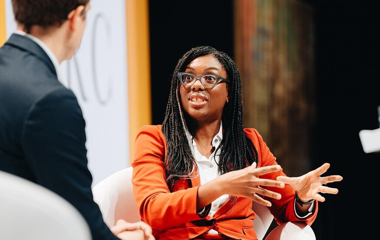 Kemi Badenoch sits and talks.