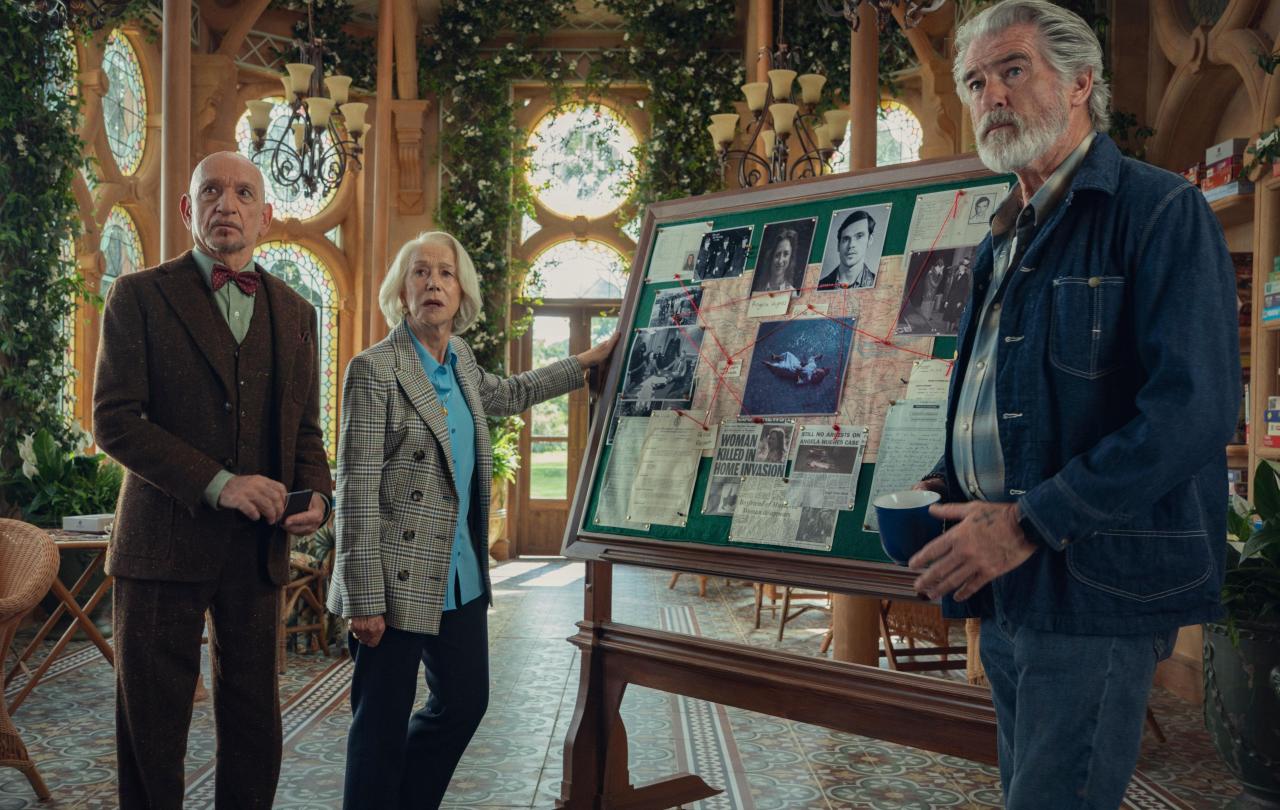 Elderly amateur sleuth stand by their pinboard.