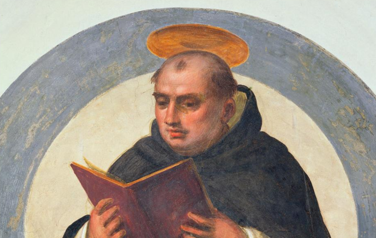 Thomas Aquinas reads.