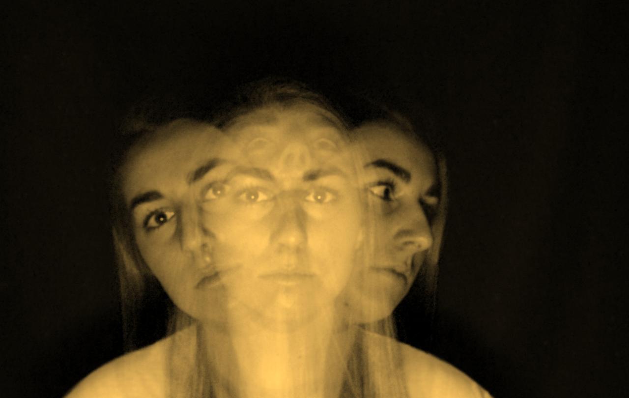A multiple exposure image shows a womans head and shoulders looking ahead, to the sides and above.