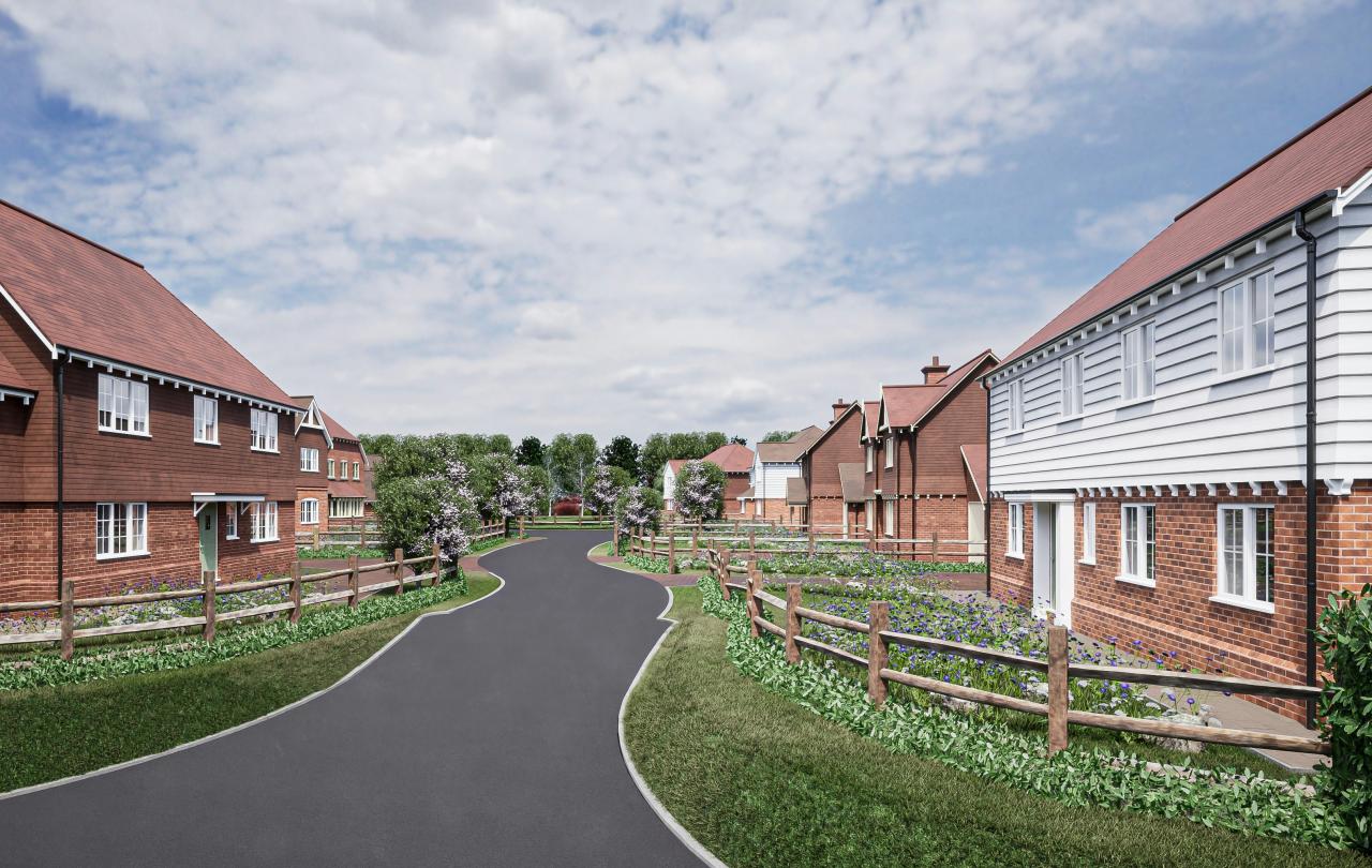 A render of a new housing estate showing a road, wooden fences and clapperboard hosues.