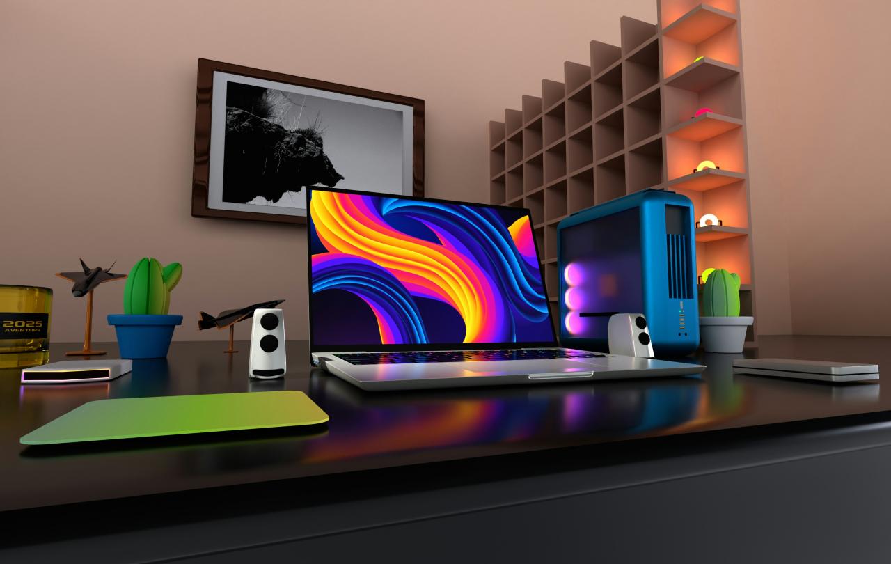 A flat screen on a desk displays a colourful pattern.