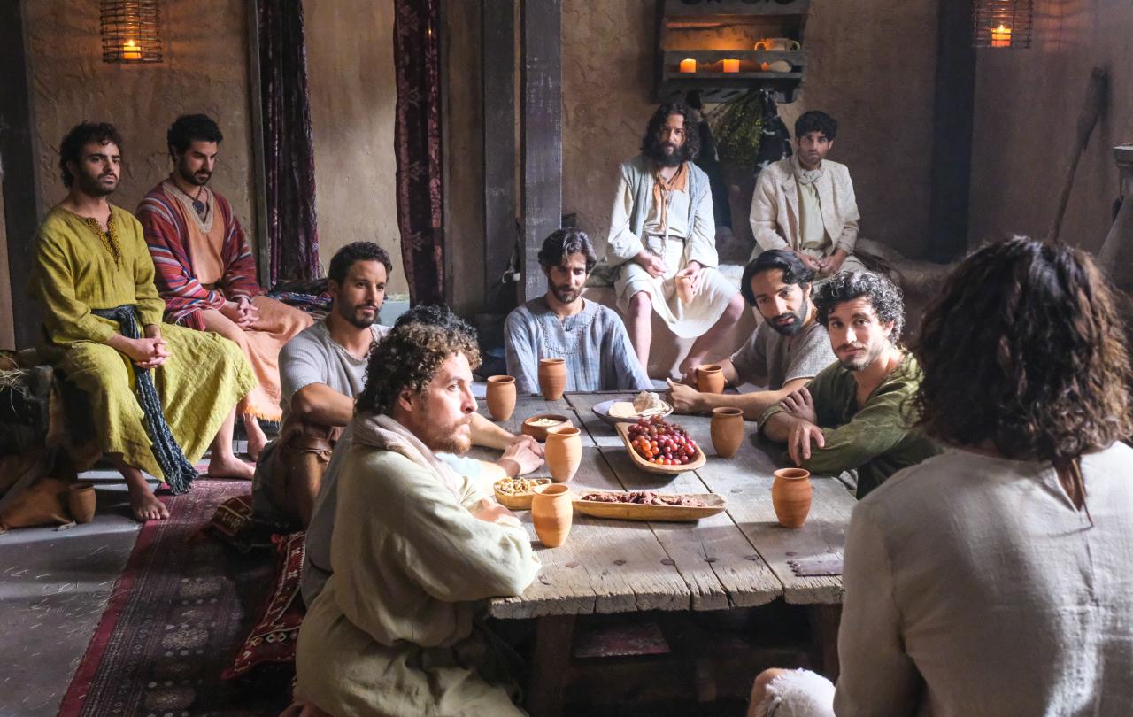 A still from The Chosen shows Jesus and the disciples around a table