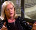 A woman talks in an interivew.