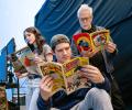 A film crew read old comics on set.