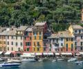 A colourful row of buildings in an Italian port.