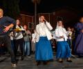 Two nuns with a band rap on stage