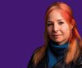 A head and shoulder image of Alice Roberts against a purple background