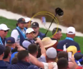 A video still shows a beer can thrown at a golf amid a crows