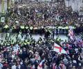 CCTV footage show two rival protests divided by a line of riot police.