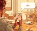 A person hold their phone on their desk, a think bubble from it says 'no'.