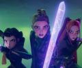 K-Popm Demon Hunters lean forward wielding weapons