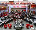 A wide angle view of the BBC newsrooms show a starm layout of desks
