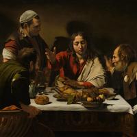 A painting depicts Jesus talking to disciples at a meal.