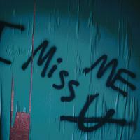 Graffiti reads 'I miss me' with u crossed out under the 'mem'