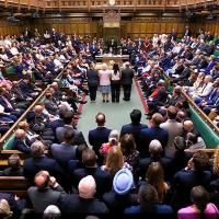 A crowded House of Commons awaits a vote.