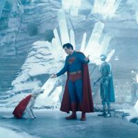 Superman talks to his dog amid the ice.