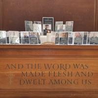 A church altar holds commemorative frames of killed journalists