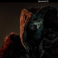 Frankstein stares our from his covered face.