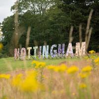 A campus sign spells out Nottingham in large letters